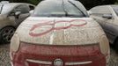 A thin film of mud covers a Fiat 500 after the floods of the nearby Danube river subsided at a car dealership in Fischerdorf, a suburb of the eastern Bavarian city of Deggendorf June 10, 2013. Tens of thousands of people have been forced to leave their homes and there have been at least a dozen deaths as a result of floods that have hit Germany, Austria, Slovakia, Poland and the Czech Republic over the past week. REUTERS/Wolfgang Rattay (GERMANY - Tags: DISASTER TRANSPORT)