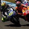 Honda MotoGP rider Marc Marquez of Spain (R) and Yamaha MotoGP rider Valentino Rossi of Italy take a curve during the Spanish Grand Prix at Jerez racetrack in Jerez de la Frontera