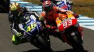 Honda MotoGP rider Marc Marquez of Spain (R) and Yamaha MotoGP rider Valentino Rossi of Italy take a curve during the Spanish Grand Prix at Jerez racetrack in Jerez de la