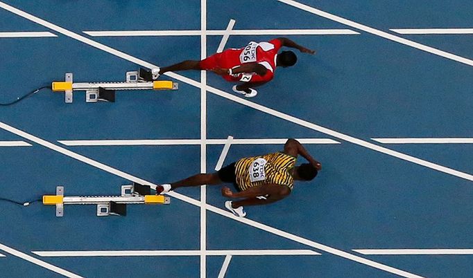 MS v atletice 2013, 100 m - rozběh: Usain Bolt a Rondel Sorrillo