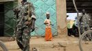 Armed soldiers stand guard at the Talodi market in South Kordofan