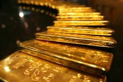 Zlato stálo poprvé v historii 1000 dolarů za unci