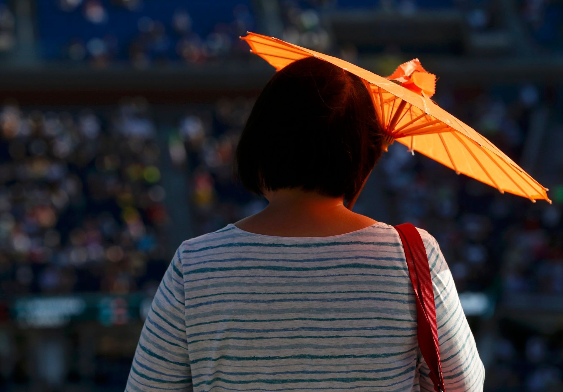 US Open 2014: fanynka se slunečníkem