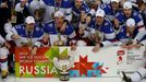 Russia's players celebrate with the trophy after winning their men's ice hockey World Championship final game against Finland at Minsk Arena in Minsk May 25, 2014. REUTER