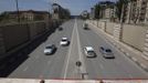 Grozny's central avenue named after former Chechen leader Akhmad Kadyrov is seen in the Chechen capital Grozny April 27, 2013. The naming of two Chechens, Dzhokhar and Tamerlan Tsarnaev, as suspects in the Boston Marathon bombings has put Chechnya - the former site of a bloody separatist insurgency - back on the world's front pages. Chechnya appears almost miraculously reborn. The streets have been rebuilt. Walls riddled with bullet holes are long gone. New high rise buildings soar into the sky. Spotless playgrounds are packed with children. A giant marble mosque glimmers in the night. Yet, scratch the surface and the miracle is less impressive than it seems. Behind closed doors, people speak of a warped and oppressive place, run by a Kremlin-imposed leader through fear. Picture taken April 27, 2013. REUTERS/Maxim Shemetov (RUSSIA - Tags: SOCIETY POLITICS TRANSPORT CITYSCAPE) ATTENTION EDITORS: PICTURE 21 OF 40 FOR PACKAGE 'INSIDE MODERN CHECHNYA'. SEARCH 'REBUILDING CHECHNYA' FOR ALL IMAGES Published: Kvě. 1, 2013, 7:59 dop.