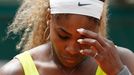 Serena Williams of the U.S. reacts during her women's singles match against Garbine Muguruza of Spain at the French Open tennis tournament at the Roland Garros stadium in