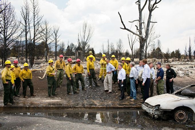 June 29, 2012 "The President views fire damage with firefighters and elected officials in Colorado Springs, Colo., after the devastating wildfires swept through the region the week before."