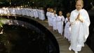 A Buddhist nun walks in line with novice Thai nuns at the Sathira Dammasathan Buddhist meditation centre in Bangkok