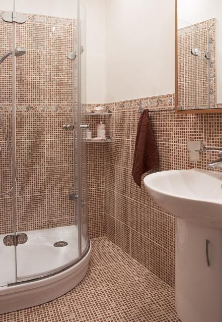 O tom, že "mozaika" může být použita nejen jako dekorační prvek, svědčí tato koupelna