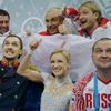 Tatiana Volosozhar and Maxim Trankov of Russia compete during the Team Pairs Short Program at the Sochi 2014 Winter Olympics