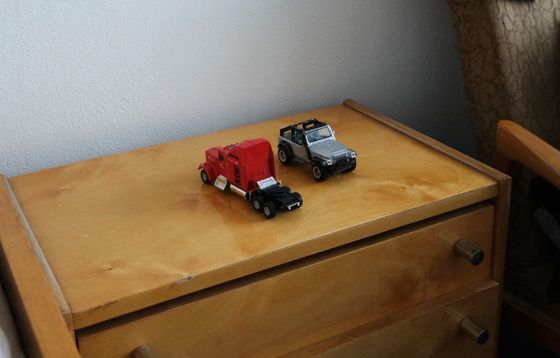 Two children, two toy cars on the bedside table. Ukrainian boys were shocked by the war, now they sleep more peacefully.