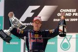 Sebastien Vettel slaví svůj trium