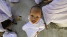 A novice Thai nun smiles at the Sathira Dammasathan Buddhist meditation centre in Bangkok