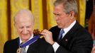 President Bush presents the Presidential Medal of Freedom to economist Gary S. Becker during a ceremony in the East Room of the White House in Washington,Nov. 5, 2007