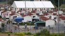 An authorised Roma camp is seen after about 50 men were taken away during an overnight police raid in Rome May 15, 2008. Italian police arrested hundreds of suspected illegal immigrants on Thursday in a sign of the new right-wing government's determination to clamp down. Some of those held in the operation, which stretched from northern Italy to the Campania region around Naples, were ordered to be immediately expelled. REUTERS/Chris Helgren (ITALY)