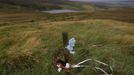 RNPS IMAGES OF THE YEAR 2012 - Toys and tributes left by the family of Moors murder victm Keith Bennett are seen tied to a fence on Saddleworth Moor near Manchester northern England, August 17, 2012. Police are investigating whether Moors murdered Ian Brady has revealed the location of Bennett's body. REUTERS/Phil Noble (BRITAIN - Tags: CRIME LAW HEALTH) Published: Pro. 4, 2012, 1:06 dop.