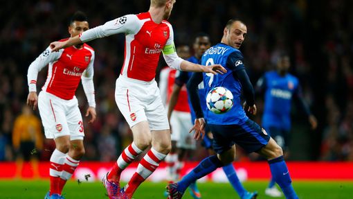 Football: Monaco's Dimitar Berbatov in action with Arsenal's Per Mertesacker