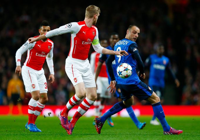 Football: Monaco's Dimitar Berbatov in action with Arsenal's Per Mertesacker