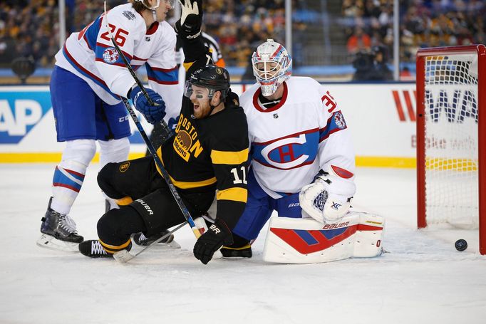 Boston Bruins right wing Jimmy Hayes (11) celebrates in front of Montreal Canadiens goalie Mike Condon (39)