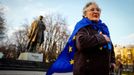 A woman wrapped with European Union flag speaks during a pro-Ukrainian rally in Luhansk, eastern Ukraine April 15, 2014.