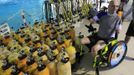 French athlete Philippe Croizon whose arms and legs were amputated after an electric shock accident in March 1994, waits next to a 33 metre (36 yard) deep pool, the world's deepest pool built to train professional divers, at Nemo33 diving centre in Brussels January 10, 2013. Croizon, who swam with adapted prostheses that had fins attached, broke a world record and became the first disabled person to dive to 33 metres, according to the organisers. REUTERS/Yves Herman (BELGIUM - Tags: SOCIETY SPORT DIVING) Published: Led. 10, 2013, 4:31 odp.