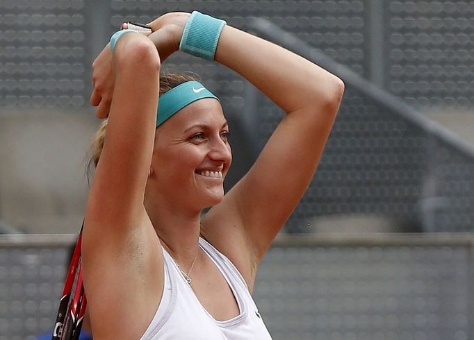 Petra Kvitova of the Czech Republic celebrates winning her final match against Svetlana  Kuznetsova of Russia at the Madrid Open tennis tournament in Madrid, Spain