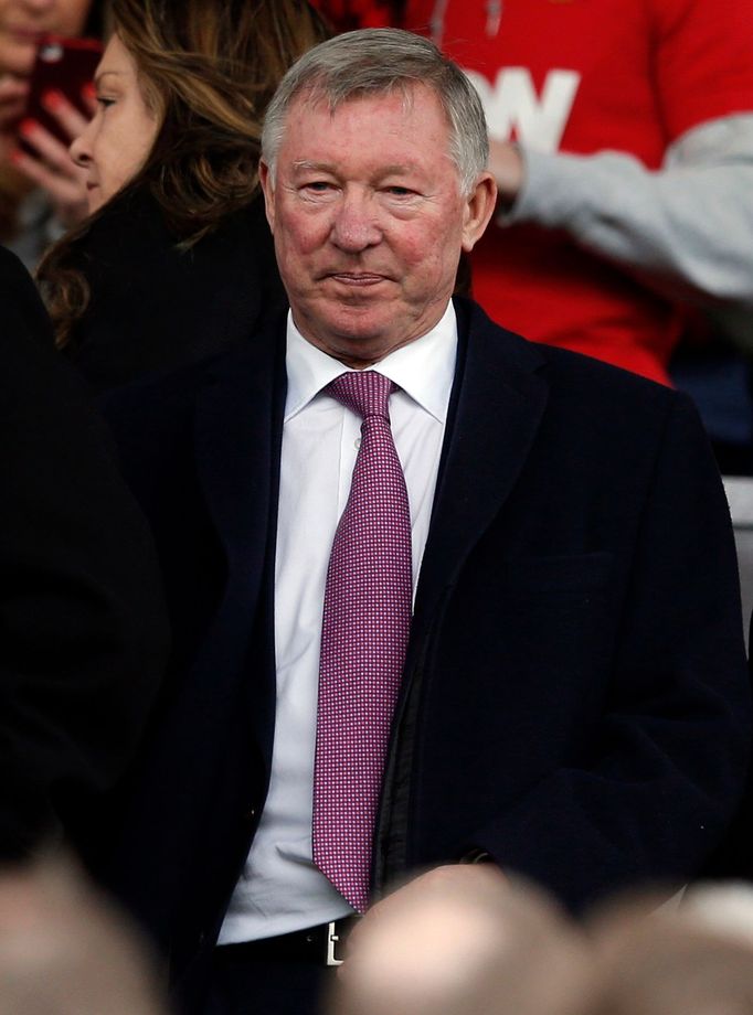 Former Manchester United manager Ferguson takes his seat in the stands before their English Premier League soccer match against Liverpool in Manchester