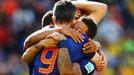 Memphis Depay of the Netherlands (R) celebrates after scoring his team's third goal against Australia with teammate Robin van Persie of the Netherlands during their 2014