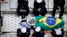 Soccer Football - Death of Brazilian soccer legend Pele - Santos, Brazil - January 3, 2023 Members of the National Guard are pictured as the casket of Brazilian soccer le