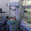Babies are seen inside a nursery at a children's hospital that was partially damaged from recent airstrikes, in a rebel held area of Aleppo