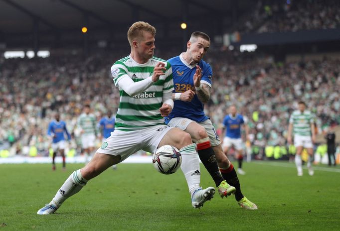 Soccer Football - Scottish Cup Semi Final - Celtic v Rangers - Hampden Park, Glasgow, Scotland, Britain - April 17, 2022 Rangers' Ryan Kent in action with Celtic's Stephe