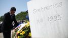 Croatian Prime Minister Zoran Milanovic lays flowers near a memorial plaque at Memorial Center in Potocari during a mass burial, near Srebrenica July 11, 2012. The bodies of 520 recently identified victims of the Srebrenica massacr is buried on July 11, the anniversary of the massacre when Bosnian Serb forces commanded by Ratko Mladic slaughtered 8,000 Muslim men and boys and buried them in mass graves, in Europe's worst massacre since World War Two. REUTERS/Dado Ruvic (BOSNIA - Tags: CONFLICT OBITUARY ANNIVERSARY POLITICS)