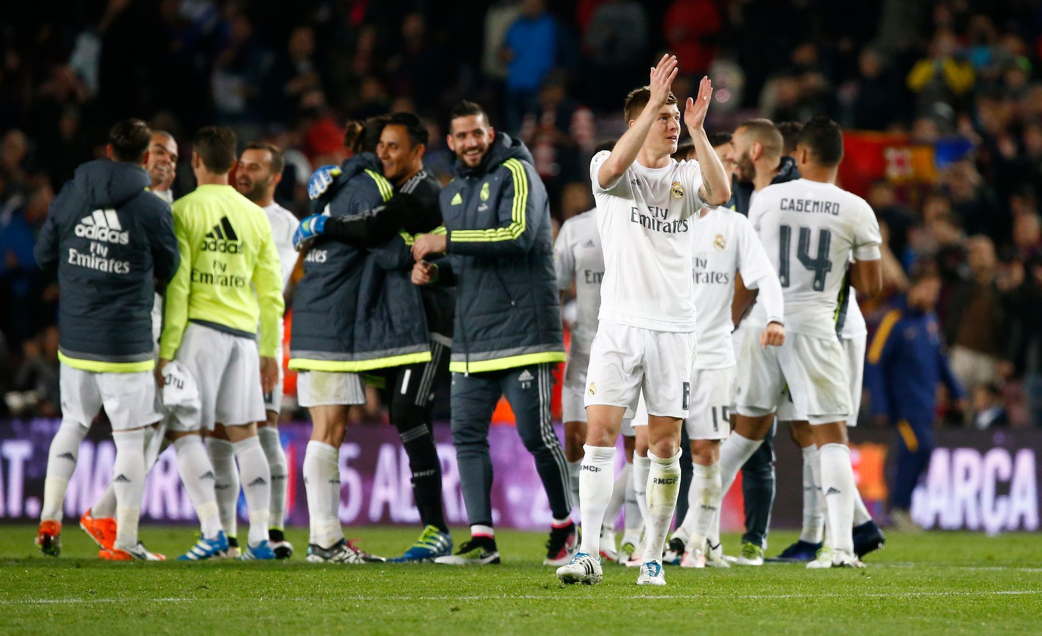 Real Madrid's Toni Kroos and teammates celebrate after the match