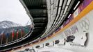 Pilot Jan Vrba (front) of the Czech Republic and his teammates speed down the track during a four-man bobsleigh training session at the Sanki Sliding Center in Rosa Khuto