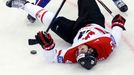 France's Jonathan Janil (55) knocks Canada's Nazem Kadri to the ice during the third period of their men's ice hockey World Championship Group A game at Chizhovka Arena i