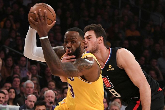 Mar 4, 2019; Los Angeles, CA, USA; Los Angeles Clippers forward Danilo Gallinari (8) fouls Los Angeles Lakers forward LeBron James (23) as James drives to the basket duri