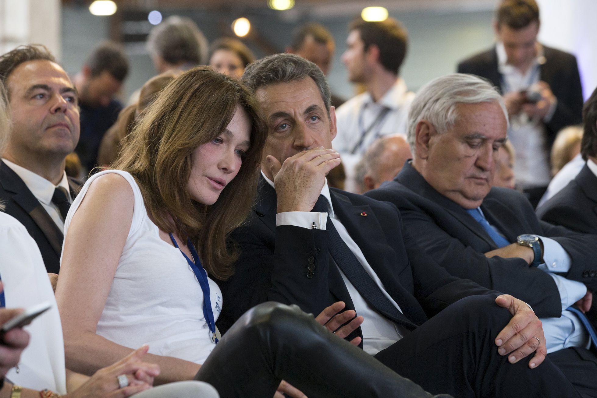 Nicolas Sarkozy, former French president and head of the newly renamed &quot;The Republicans&quot; political party, and his wife Carla Bruni-Sarkozy attend a rally in Paris