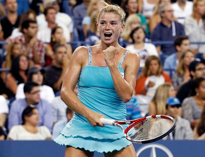 Camila Giorgiová slaví vítězství nad Caroline Wozniackou na US Open 2013