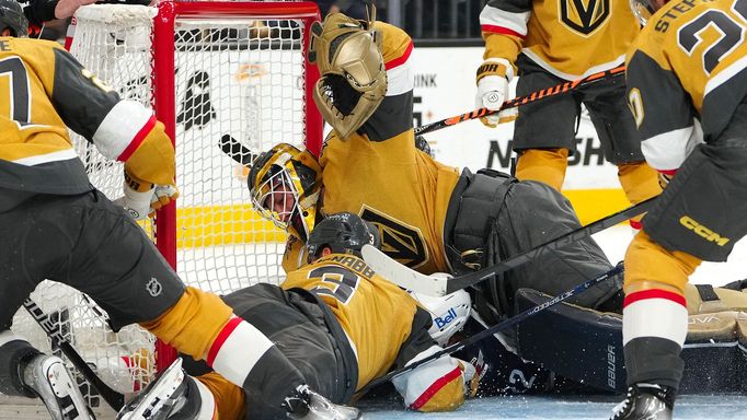 Apr 18, 2023; Las Vegas, Nevada, USA; Vegas Golden Knights goaltender Laurent Brossoit (39) and Vegas Golden Knights defenseman Brayden McNabb (3) attempt to keep the puc