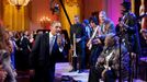 "Egged on by B.B. King, at right, the President joins in singing 'Sweet Home Chicago' during the 'In Performance at the White House: Red, White and Blues' concert in the East Room. Participants include, from left: Troy 'Trombone Shorty' Andrews, Jeff Beck, Derek Trucks, B.B. King, and Gary Clark, Jr."