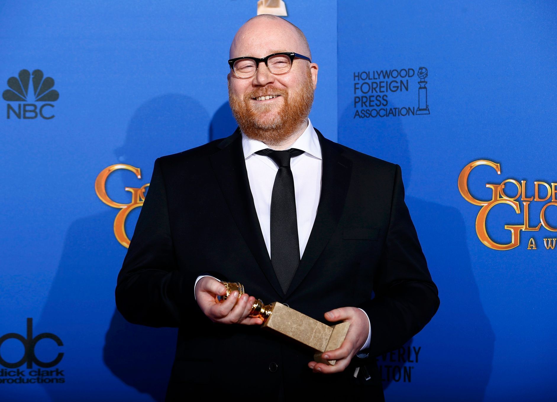 Johann Johannsson poses with his award for Best Original Score - Motion Picture for his work on &quot;The Theory of Everything&quot; backstage at the 72nd Golden Globe Awards in Beverly Hills