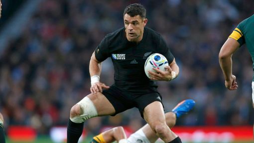 Dan Carter of New Zealand evades a tackle by Fourie Du Preez of South Africa during their Rugby World Cup semi-final match at Twickenham in London, Britain October 24, 20