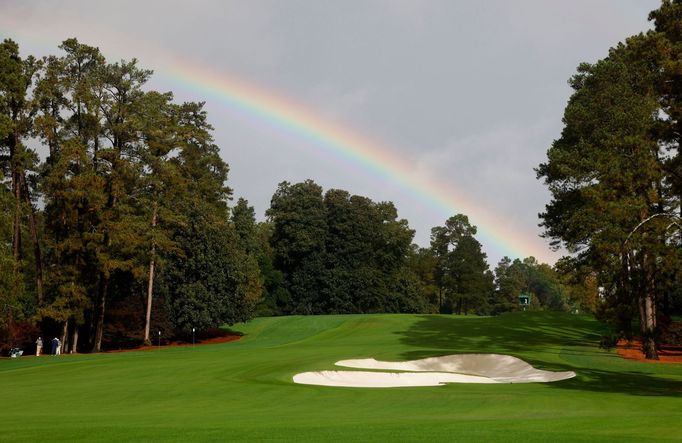 Golf - The Masters - Augusta National Golf Club - Augusta, Georgia, U.S. - November 12, 2020 A rainbow is pictured over the 8th fairway after play was suspended REUTERS/M