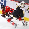 Blackhawks' Bollig collides with Bruins' Krug during Game 2