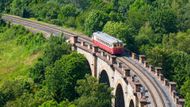 Pražský Semmering. 
Prokopské údolí překonává ojedinělá železniční trať, otevřená v roce 1872 a nesoucí název po své alpské předchůdkyni. Kvůli vysokému převýšení trasa stoupá od Smíchova velkou smyčkou po dvou mohutných kamenných viaduktech. Z vlaku jedoucího po mostech a mezi vápencovými skalami jsou nádherné výhledy na město. Půlhodinová jízda končí na Zličíně na severozápadním okraji Prahy. O víkendech a svátcích jezdí namísto běžné lokálky historický vlak s označením Pražský motoráček. Vlaky jezdí každou hodinu a ve všech platí běžné pražské jízdenky.