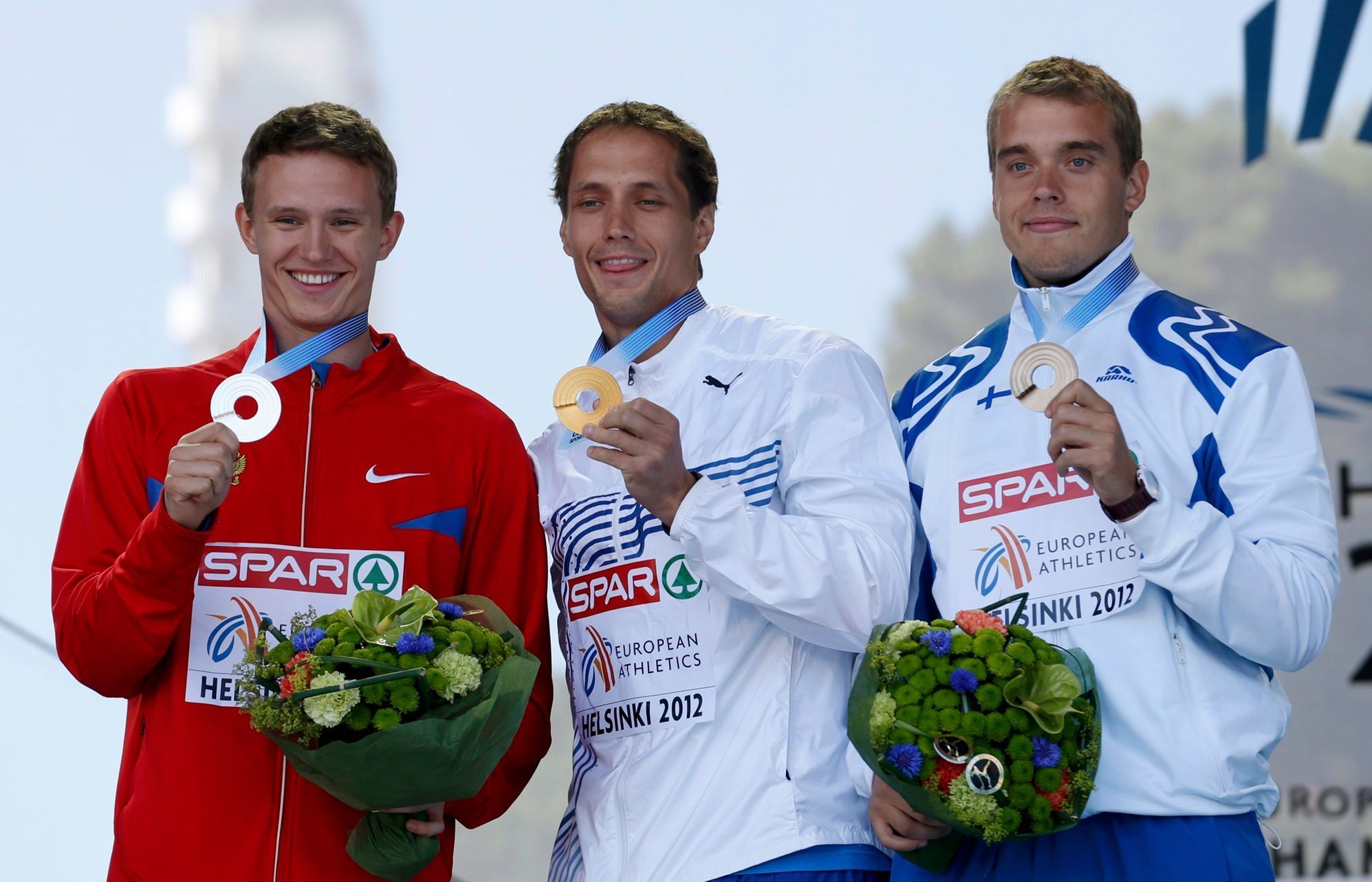 Vítězslav Veselý (uprostřed) s Rusem Iordanem (vlevo) a Mannionem z Finska