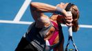 Lucie Safarova of the Czech Republic serves to Li Na of China during their women's singles match at the Australian Open 2014 tennis tournament in Melbourne