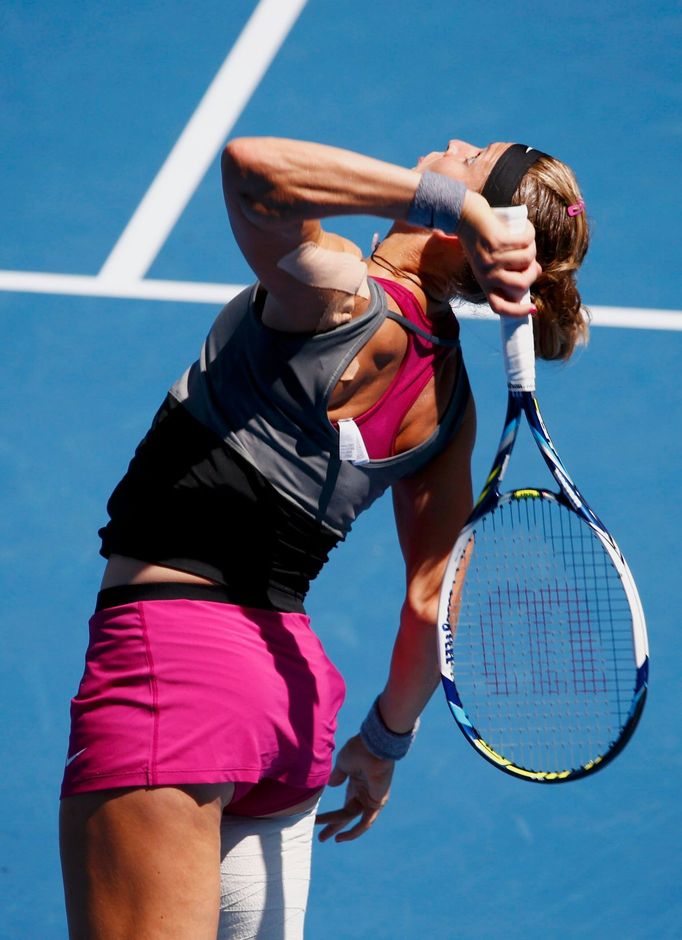 Lucie Safarova of the Czech Republic serves to Li Na of China during their women's singles match at the Australian Open 2014 tennis tournament in Melbourne