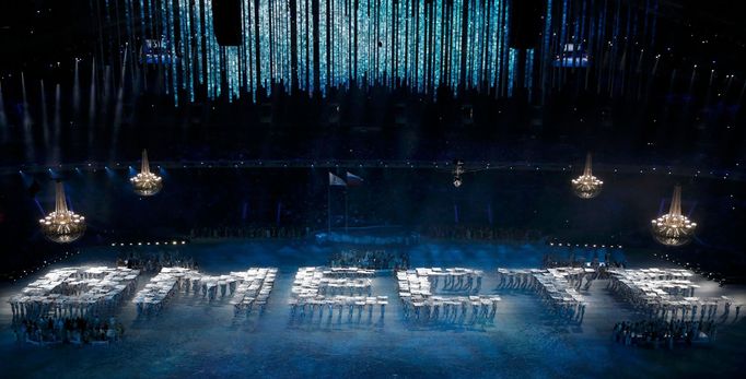 Performers form the word 'Together' during the opening ceremony of the 2014 Paralympic Winter Games in Sochi March 7, 2014. REUTERS/Christian Hartmann (RUSSIA - Tags: OLY