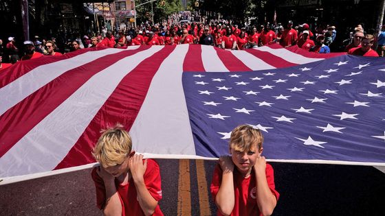 Tisíce vlajek v jeden den: Memorial Day objektivem fotoreportérů